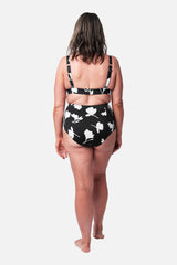 UNE PIECE Never Say Never High-Waisted Bikini Bottom in Magnolia Silhouette Black