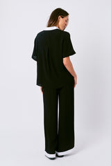UNE PIECE Palazzo Pants in Black