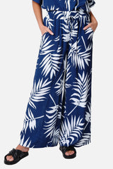 UNE PIECE Palazzo Pants in Palm Silhouette Navy